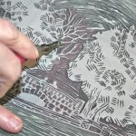 Carving into linoleum block of Ram Pasture